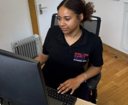 Woman sitting at reception desk